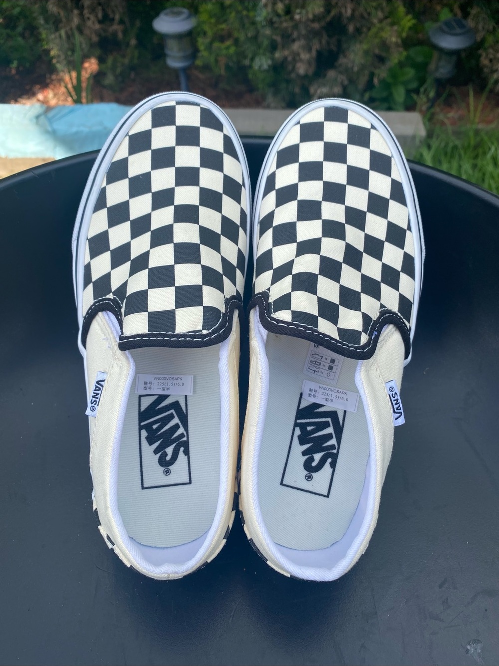 Vans Kids Checkerboard Slip-On Sneakers in Black and White